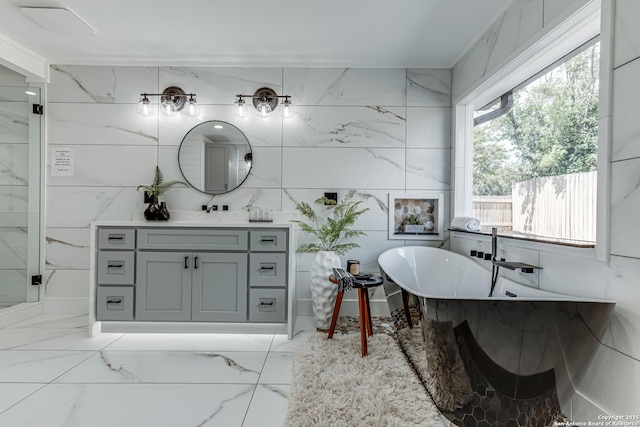 bathroom featuring vanity and a bathing tub