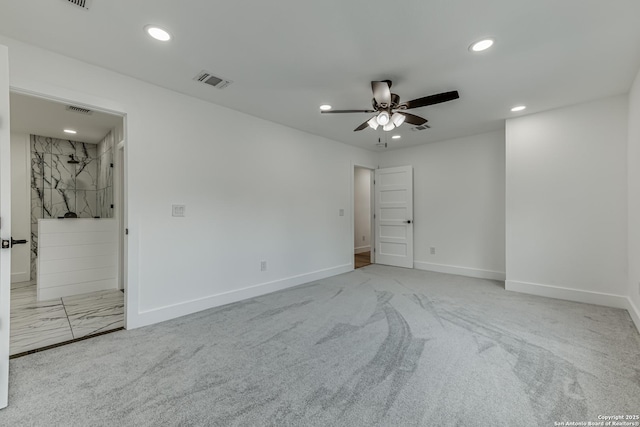 carpeted empty room with ceiling fan