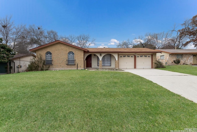 ranch-style home with a front yard and a garage