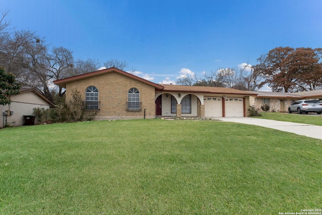 ranch-style home with a garage and a front yard