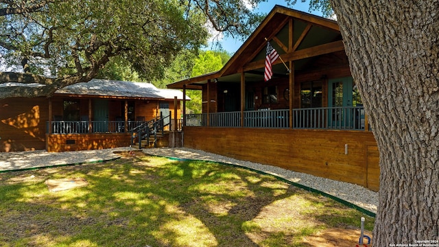 view of yard featuring a porch