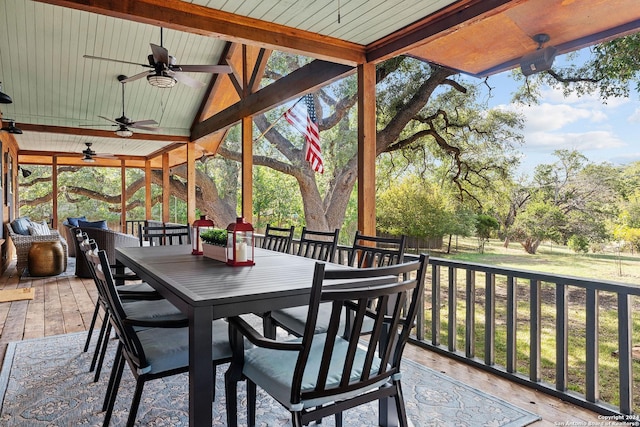 view of patio featuring ceiling fan and outdoor dining area