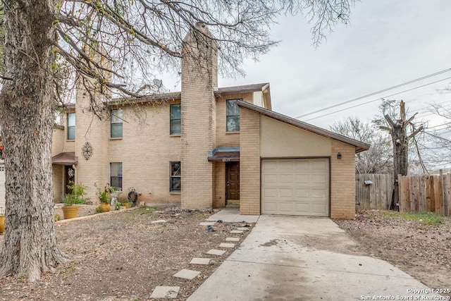 view of front of property featuring a garage