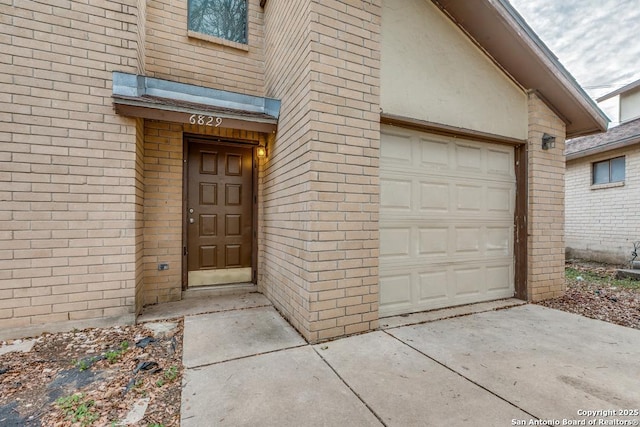 property entrance featuring a garage