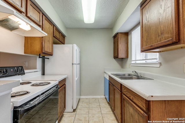 kitchen featuring light tile patterned floors, electric range, dishwasher, a textured ceiling, and sink