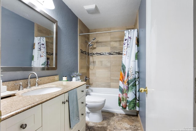 full bathroom featuring toilet, vanity, a textured ceiling, and shower / bathtub combination with curtain