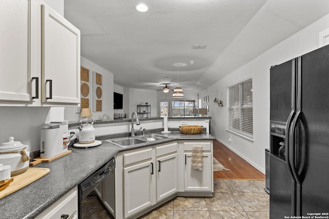 kitchen featuring black appliances, white cabinets, ceiling fan, and sink