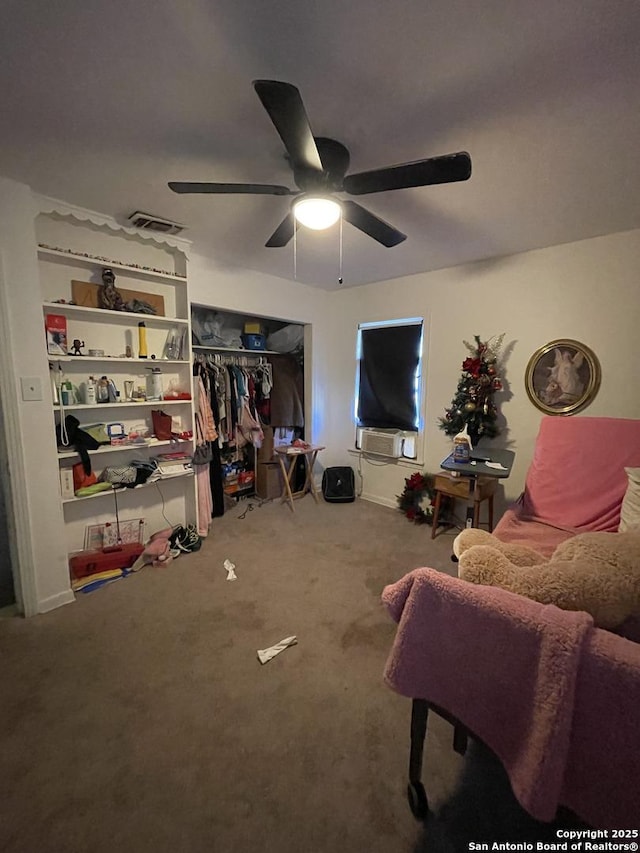 carpeted living room featuring ceiling fan