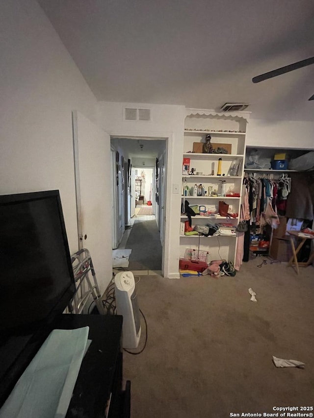 interior space with a closet and ceiling fan