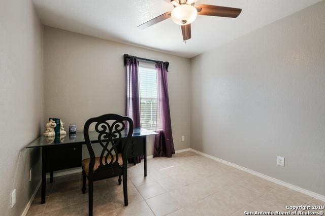 office area with ceiling fan