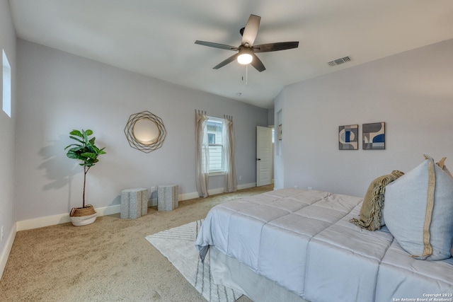 bedroom with ceiling fan and carpet