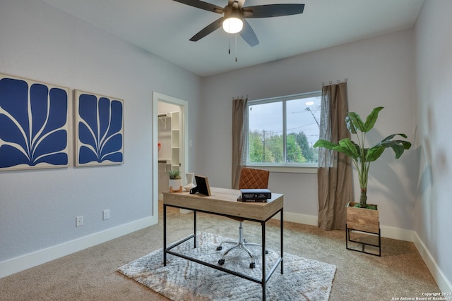 home office featuring ceiling fan and carpet flooring