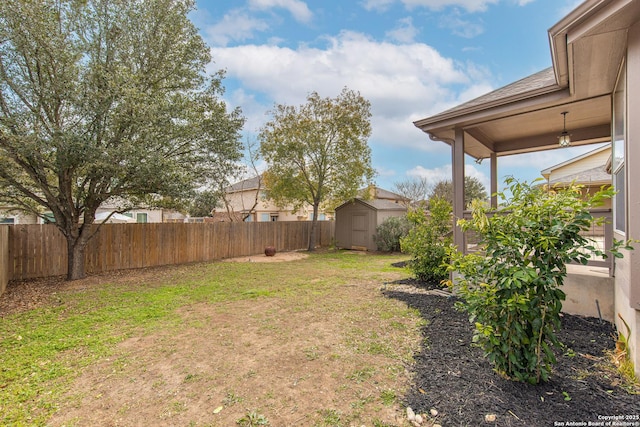 view of yard with a storage shed