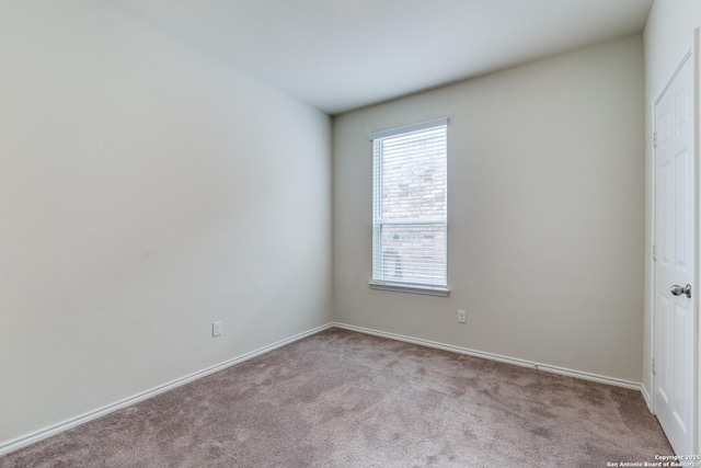 view of carpeted spare room