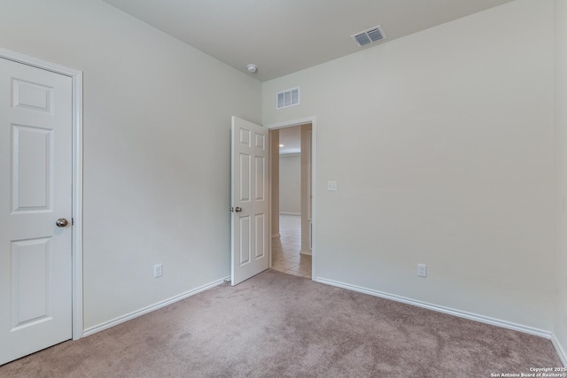 view of carpeted spare room