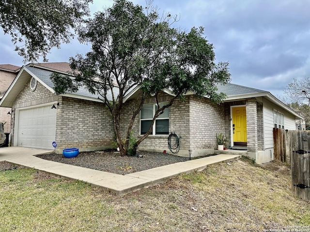 single story home featuring a garage