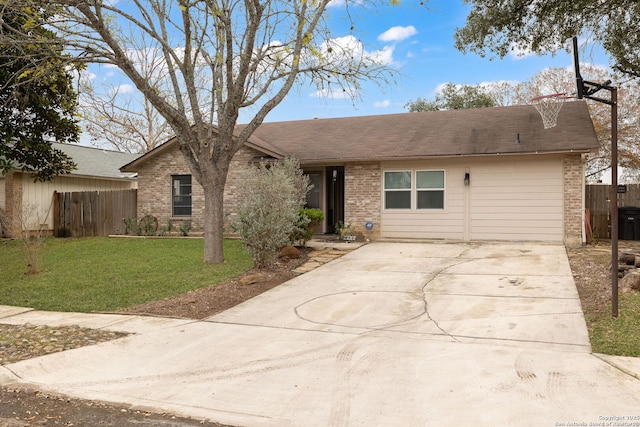 ranch-style home featuring a front yard