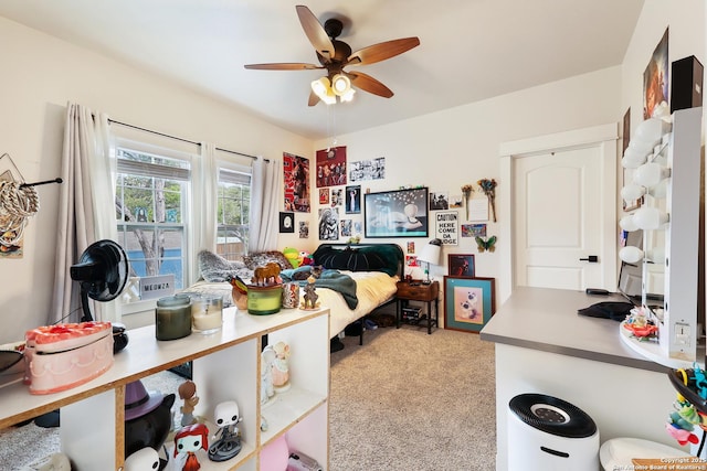 carpeted bedroom featuring ceiling fan