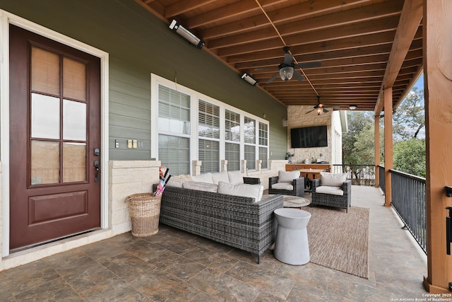 view of patio featuring ceiling fan and an outdoor hangout area