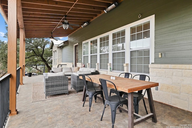 view of patio / terrace with ceiling fan and an outdoor hangout area