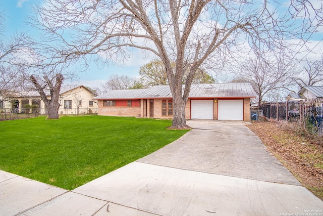 ranch-style house with a garage and a front yard