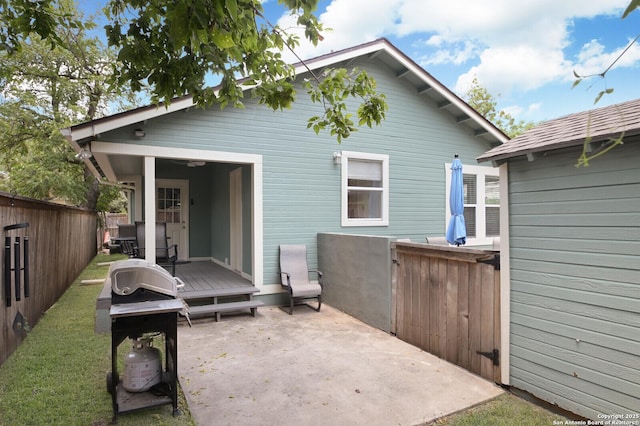 rear view of house featuring a patio