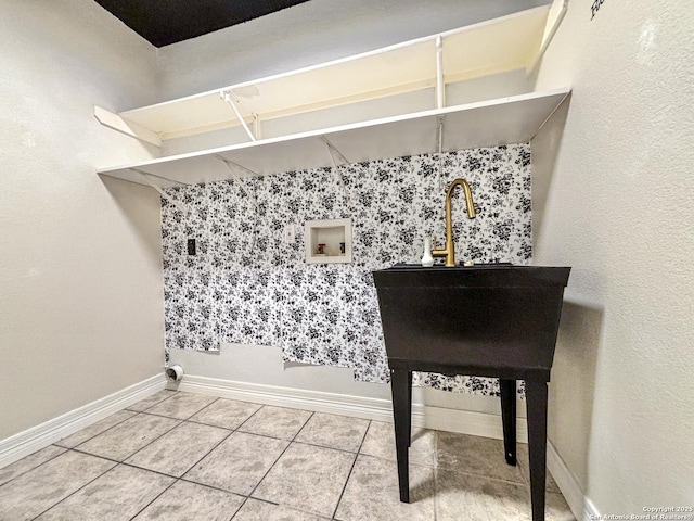 laundry area featuring tile patterned flooring and washer hookup