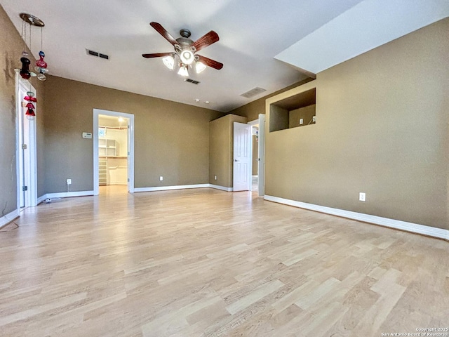 unfurnished room featuring ceiling fan and light hardwood / wood-style flooring