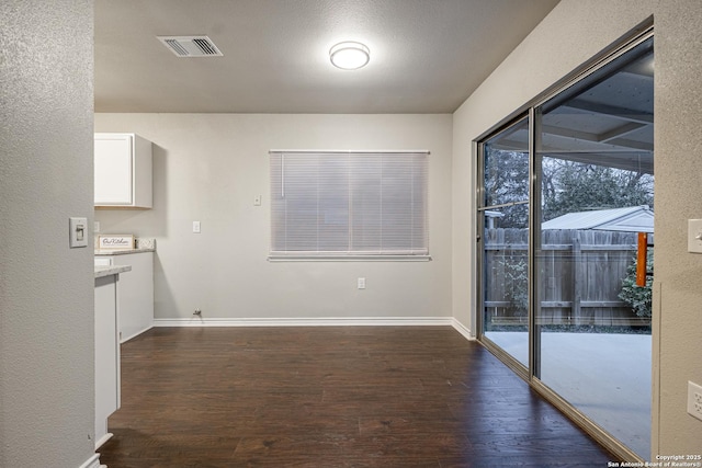 interior space featuring dark hardwood / wood-style flooring