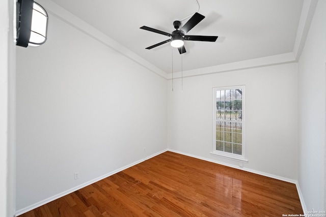 empty room featuring ceiling fan and wood-type flooring