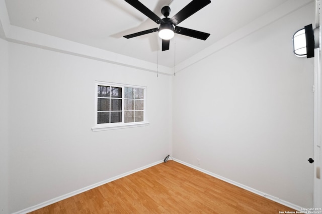 unfurnished room with ceiling fan and wood-type flooring