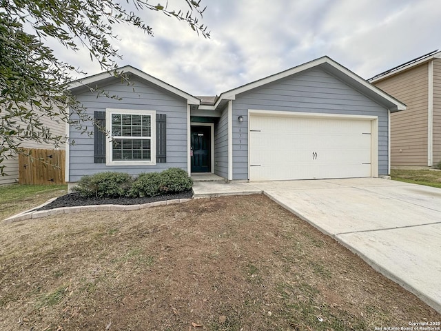 single story home with a garage