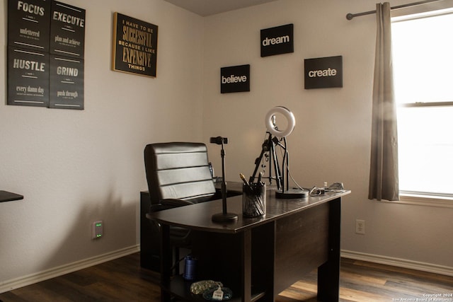 home office with wood-type flooring