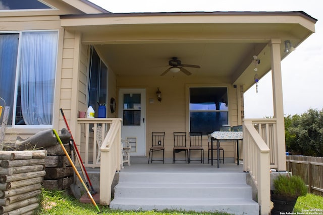 exterior space featuring ceiling fan and a porch