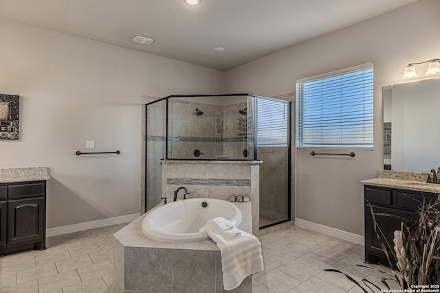 bathroom featuring vanity, independent shower and bath, and tile patterned flooring