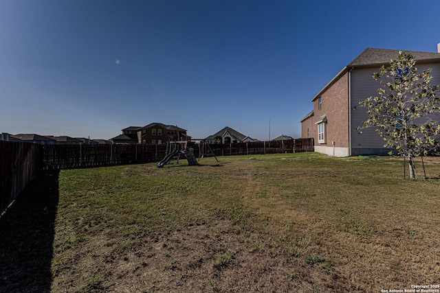 view of yard with a playground