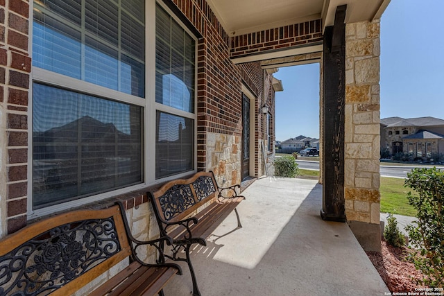 view of patio featuring a porch