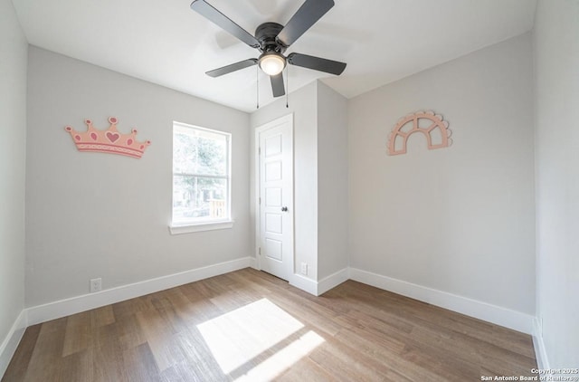 unfurnished bedroom featuring light wood-type flooring and ceiling fan