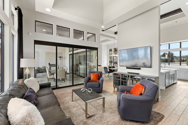 living room with a high ceiling