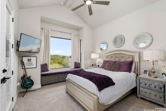 carpeted bedroom featuring ceiling fan and lofted ceiling with beams