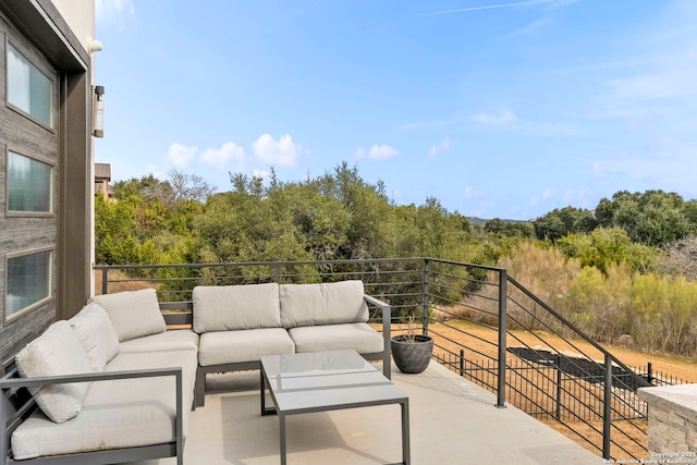 view of patio / terrace featuring a balcony and outdoor lounge area