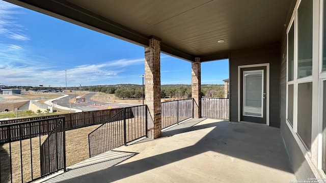 view of patio / terrace featuring a balcony