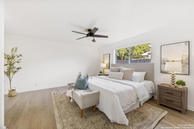 bedroom featuring ceiling fan and light wood-type flooring