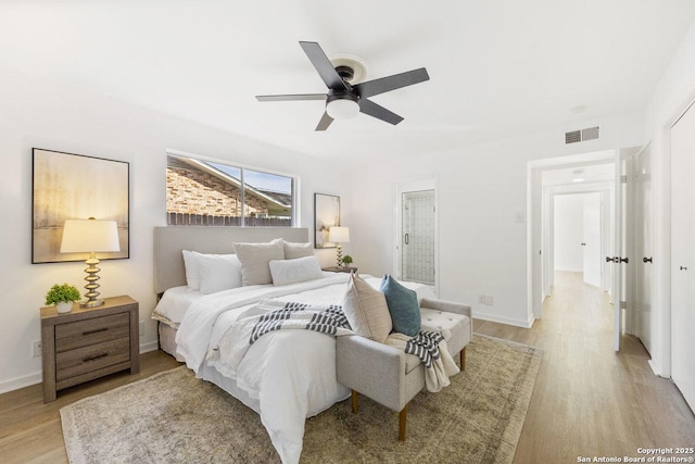 bedroom with ceiling fan and light hardwood / wood-style floors