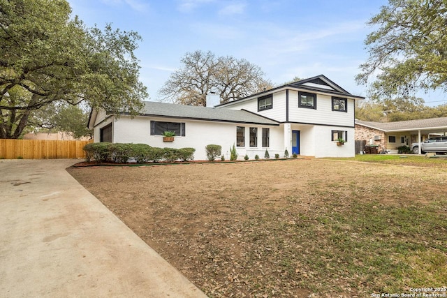 view of front of property with a front lawn