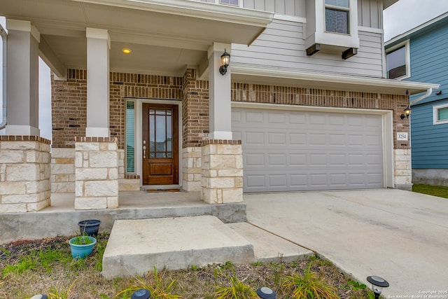 entrance to property featuring a garage