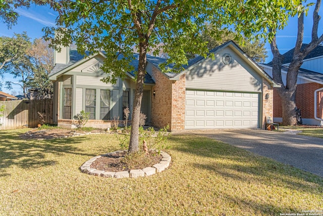 ranch-style home with a front lawn and a garage