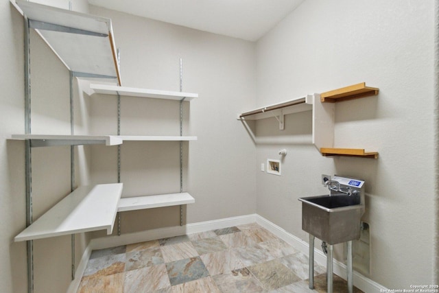 washroom with electric dryer hookup and hookup for a washing machine