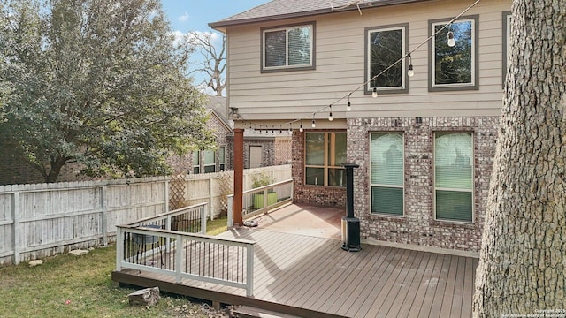 wooden deck with a patio area