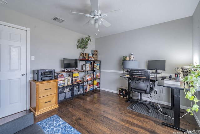 office area with ceiling fan and dark hardwood / wood-style floors